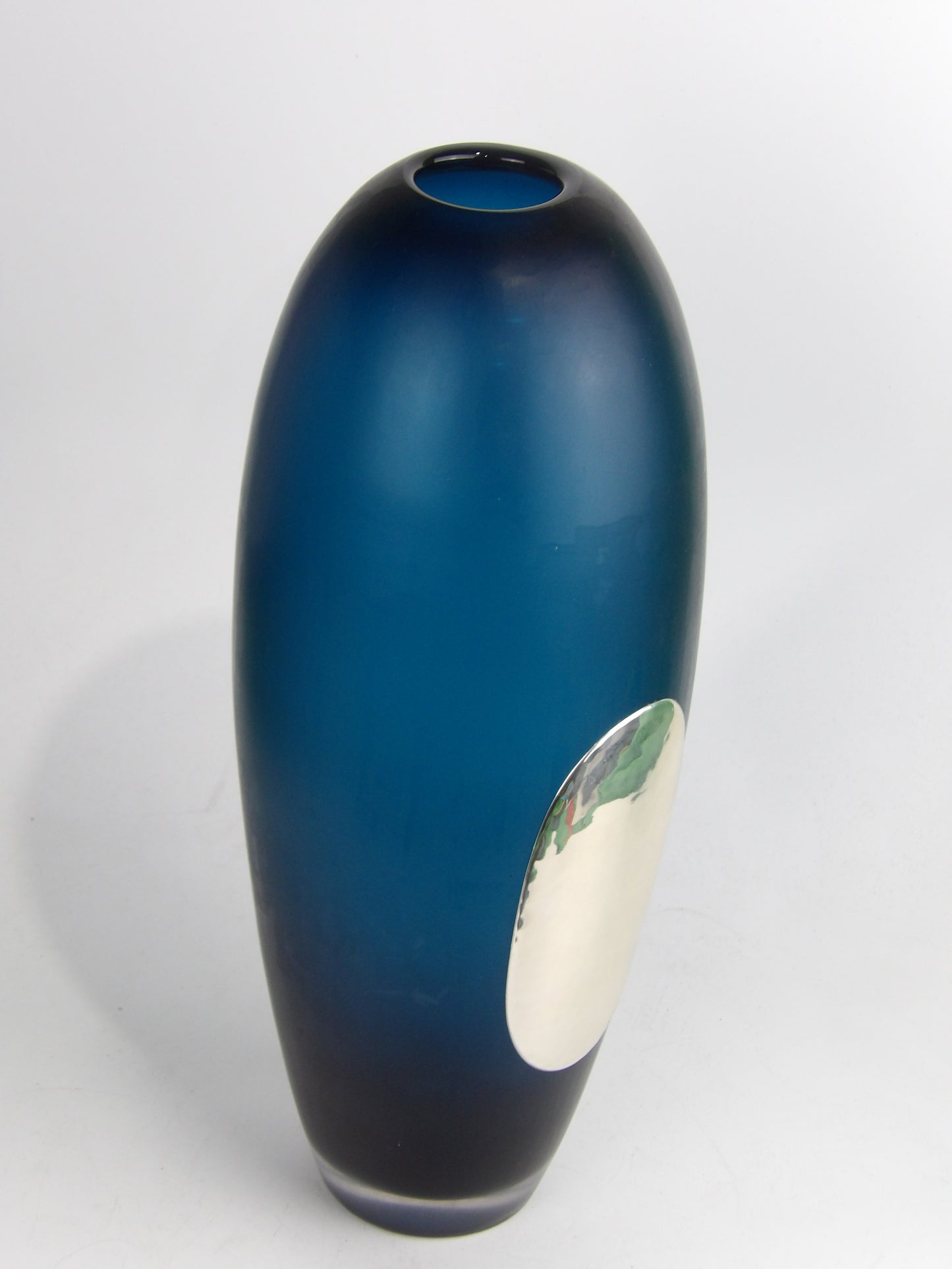 Blue long cut vase with silver coated bilaminate