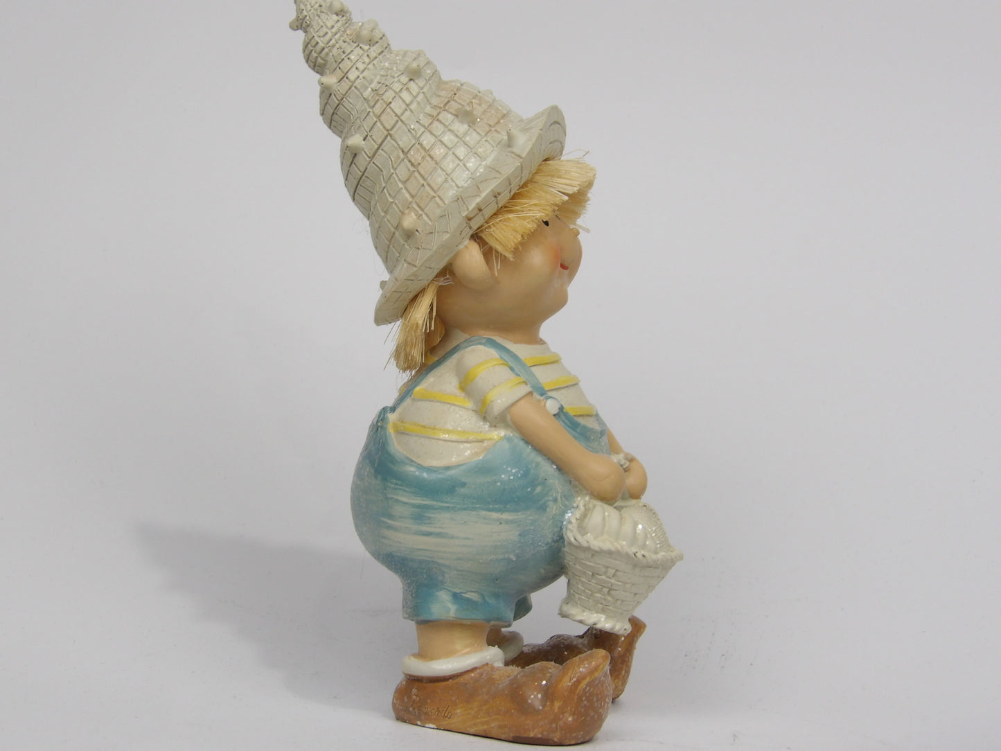 Child Forest Gnome holding basket /sculpture
