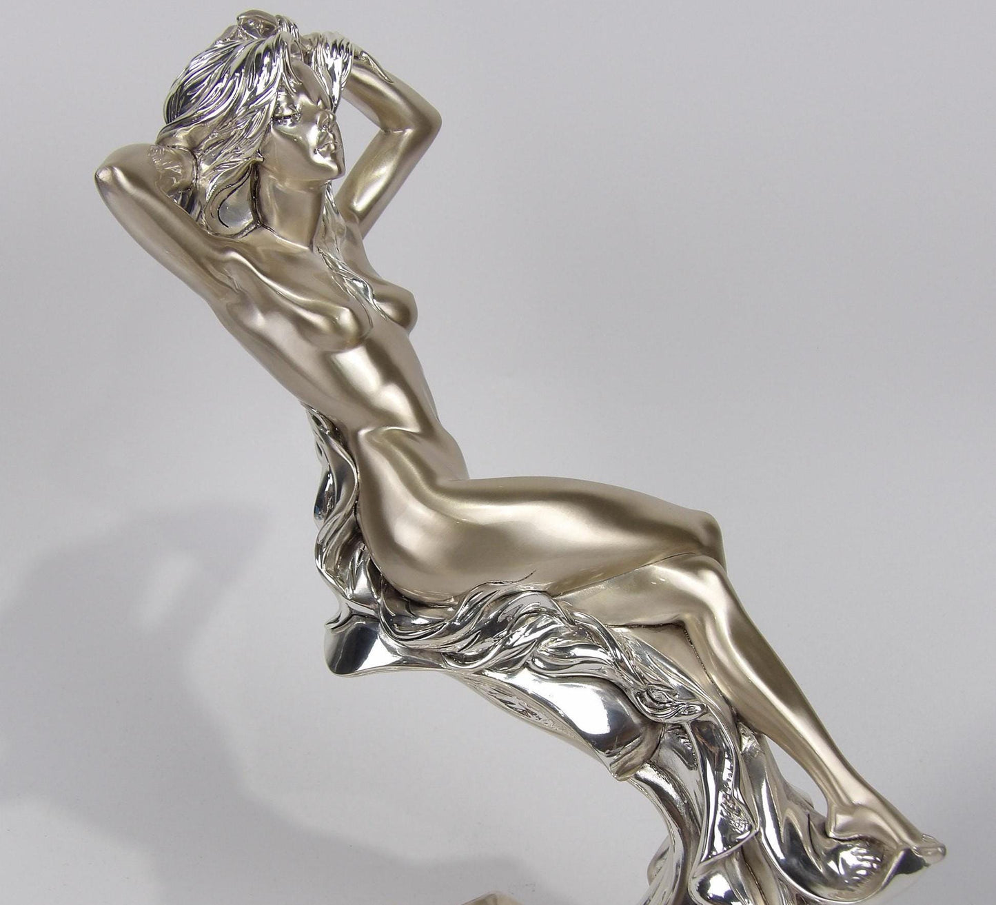 Silver-Coated Resin Sculpture of Woman Posing - Elegant and Graceful Decor