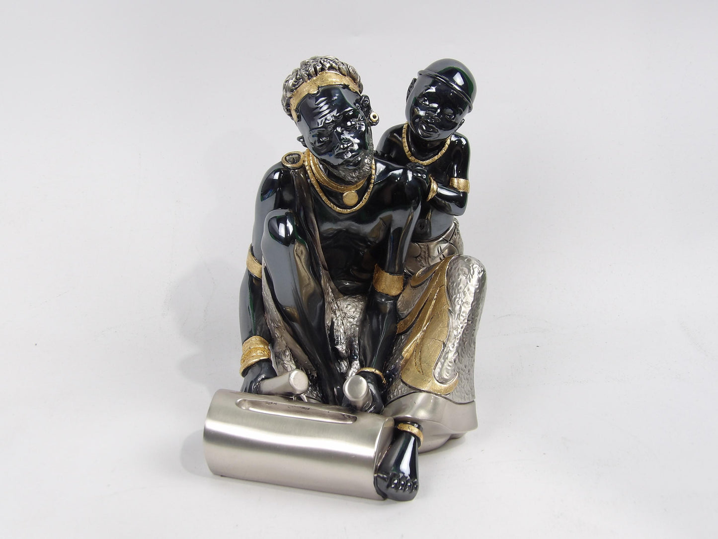 Man and Child Playing the Trunk Sculpture - Silver Resin with Golden Details: A Symbol of Heritage and Connection