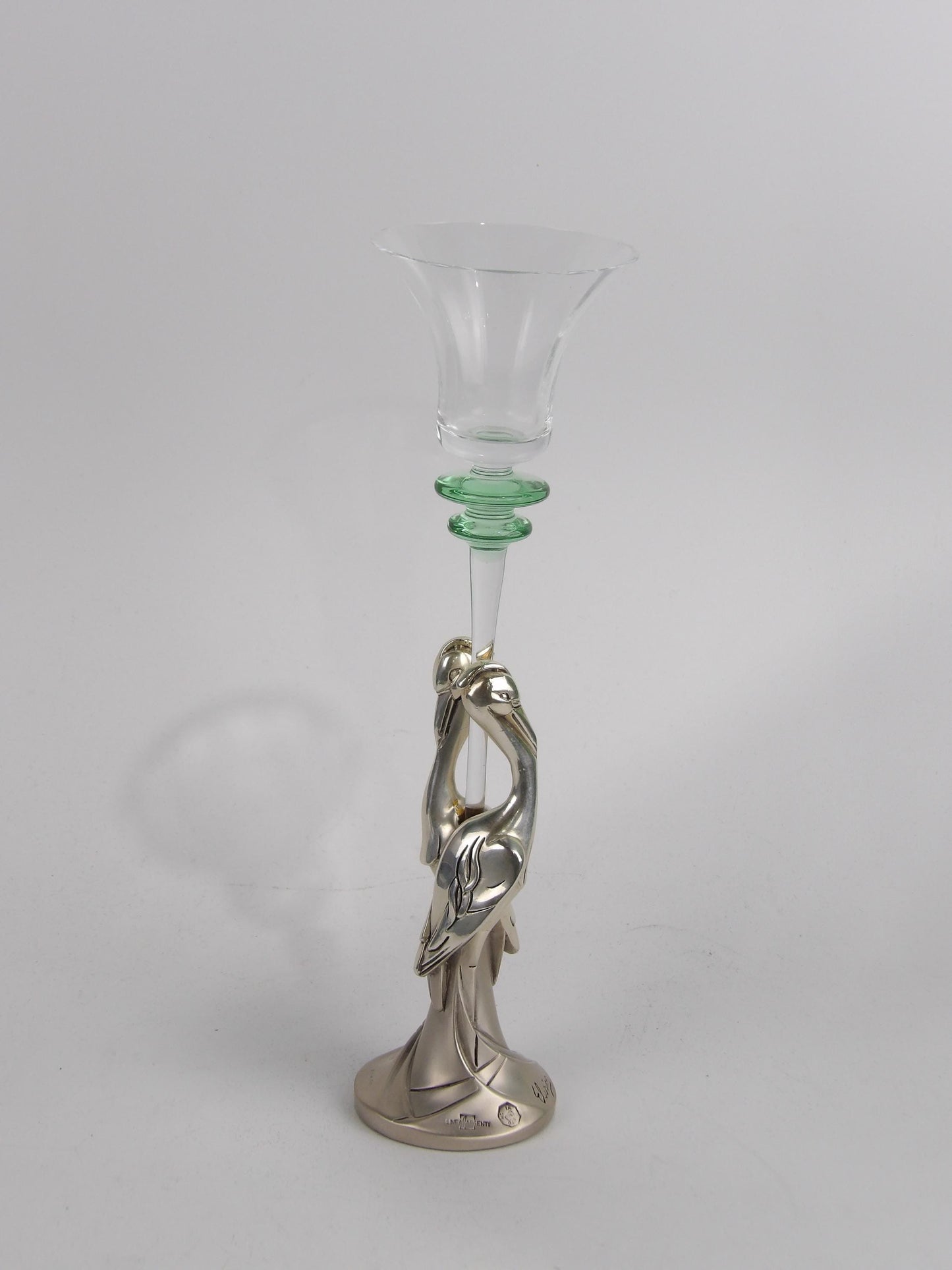 Gansos de vidrio transparente con detalles verdes y resina plateada