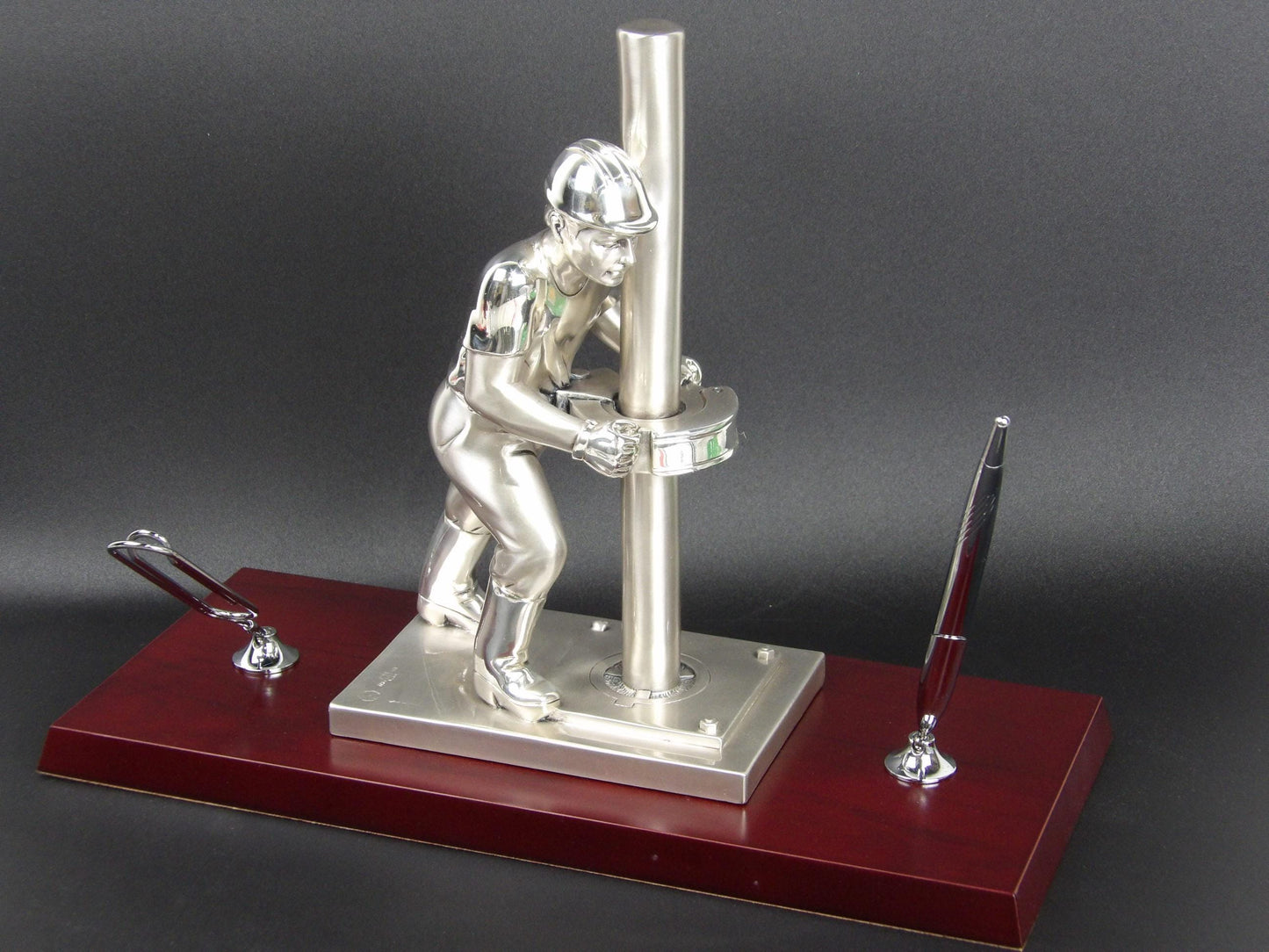 Trades Sculpture – Silver-Coated Resin with Mahogany Base: A Tribute to Craftsmanship