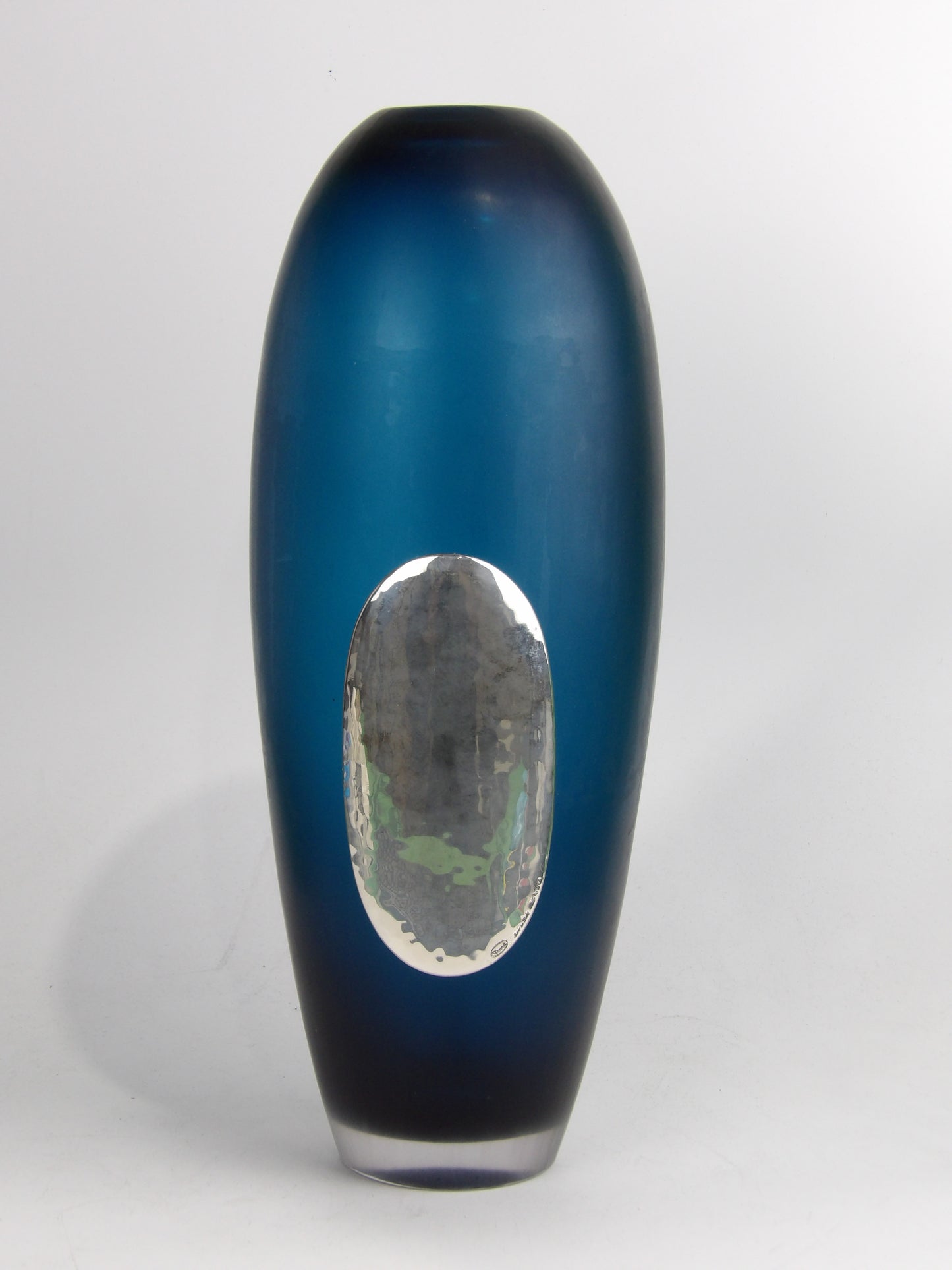 Blue long cut vase with silver coated bilaminate