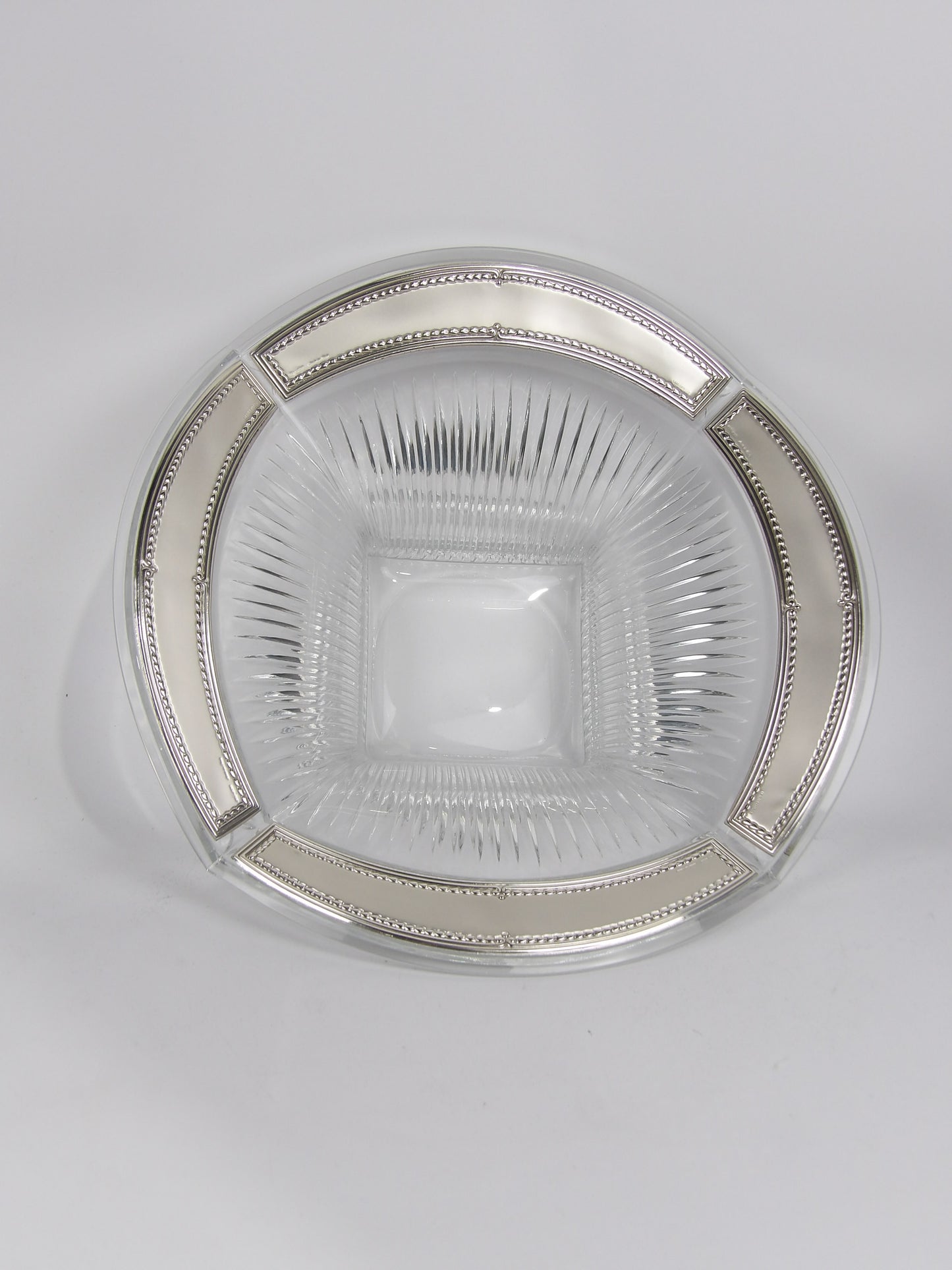 Cuenco de cristal con ribete en bilaminado bañado en plata.