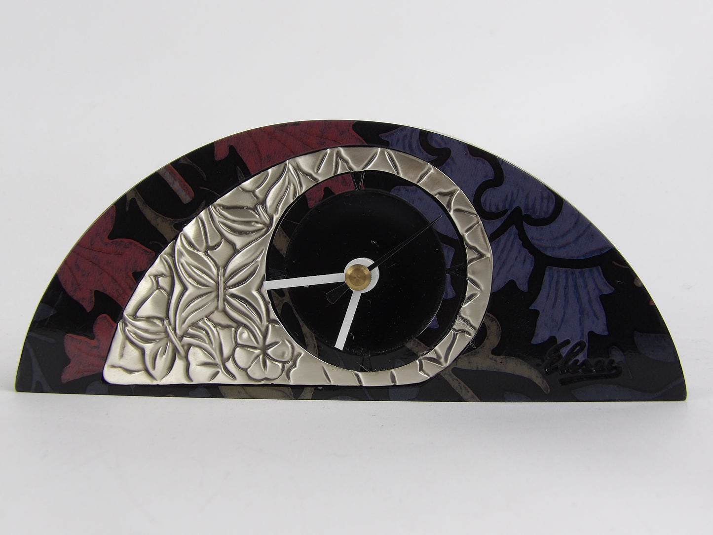 Reloj de sobremesa de caoba negra con bilaminado plateado y diseño floral