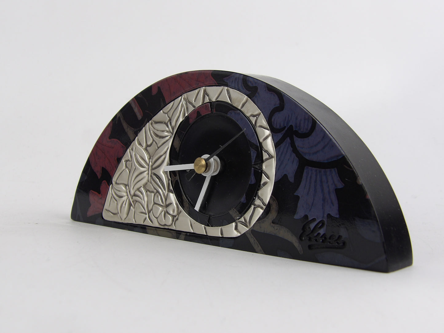 Reloj de sobremesa de caoba negra con bilaminado plateado y diseño floral