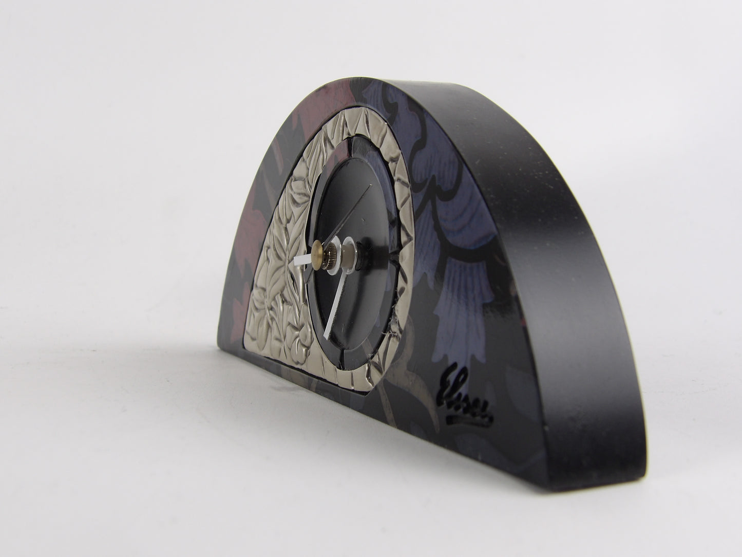 Reloj de sobremesa de caoba negra con bilaminado plateado y diseño floral