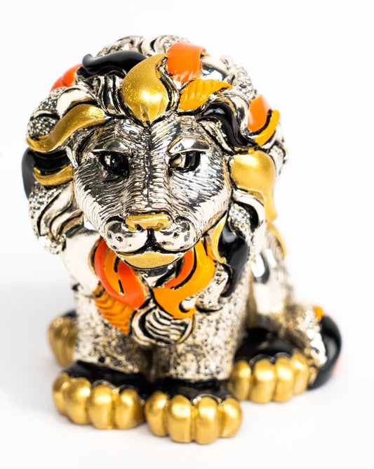 Silver-coated colored lion in leather box