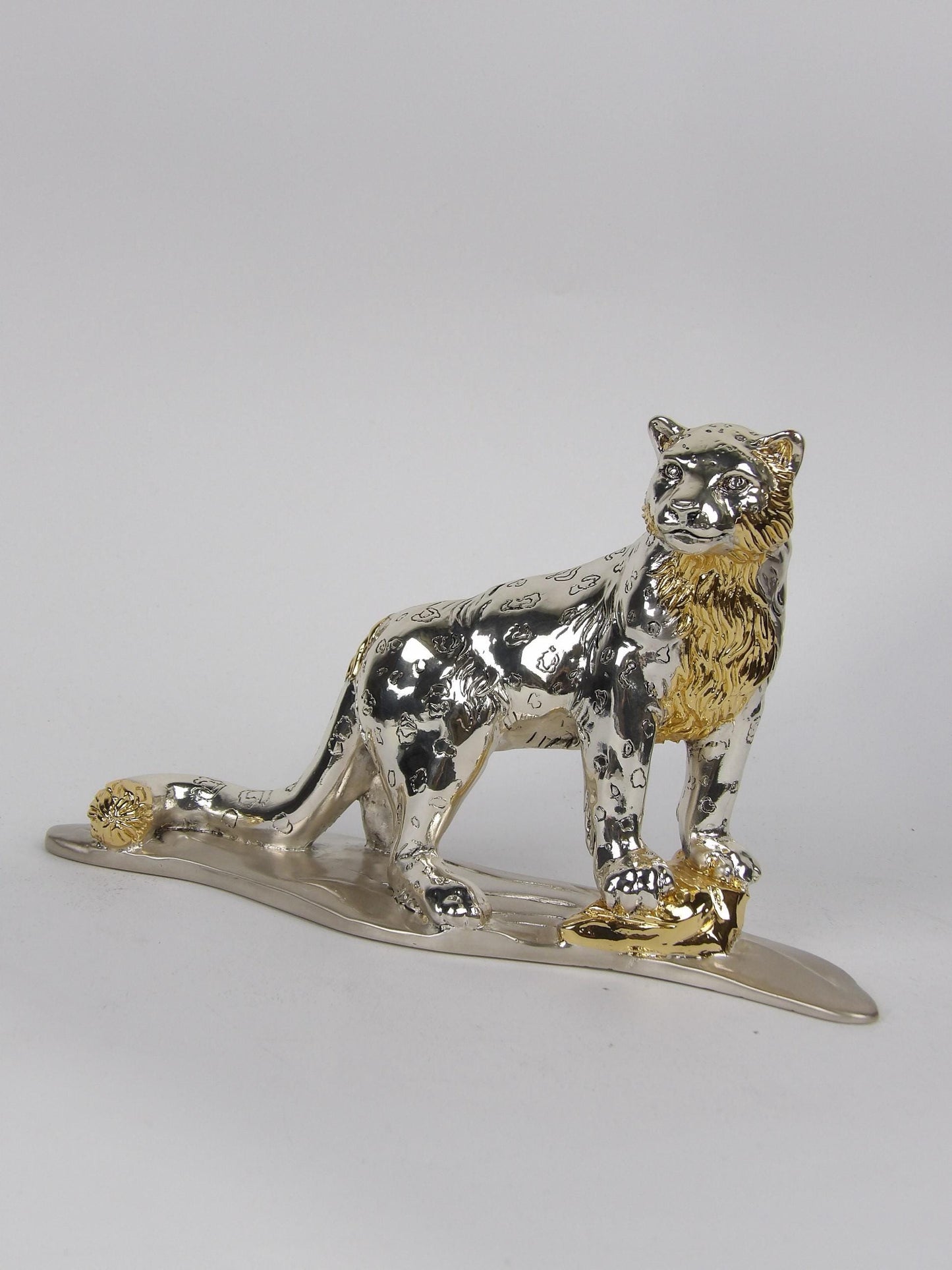 Silver & gold-coated resin statue “standing panther”