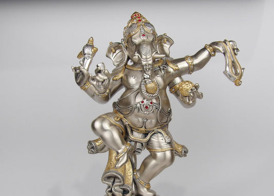 Dancing Ganesha sterling silver and decorated with pastel enameling and golden work