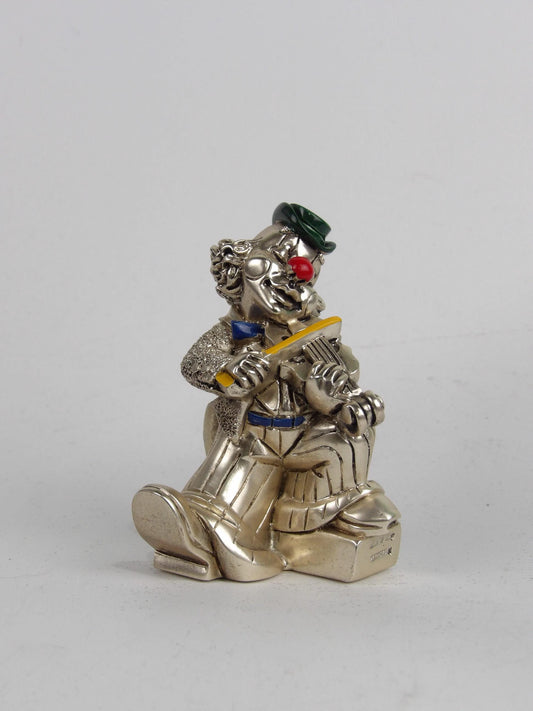 Silver Resin Clown with Colored Details – Whimsical and Vibrant Art Piece